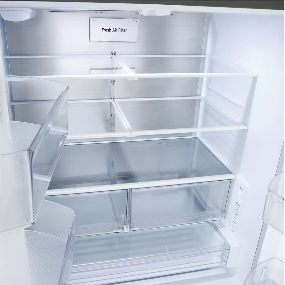 Closeup view of refrigerator shelves and drawers