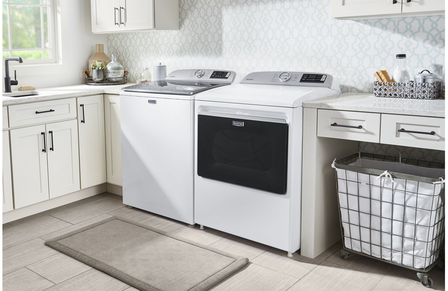 Angle view of washer and dryer in the laundry room.
