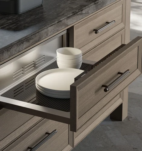 Gaggenau warming drawers installed beneath built-in kitchen appliances