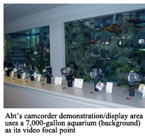 Abt's camcorder demonstration/display area uses a 7,000-gallon aquarium (background) as its video focal point
