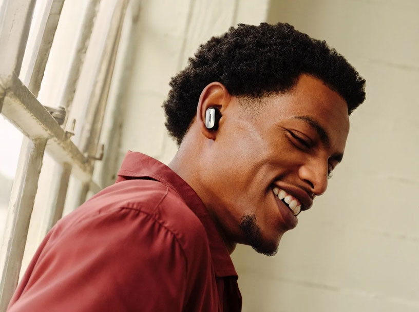 Man Wearing Bose Wireless Noise Cancelling Earbuds Outdoors