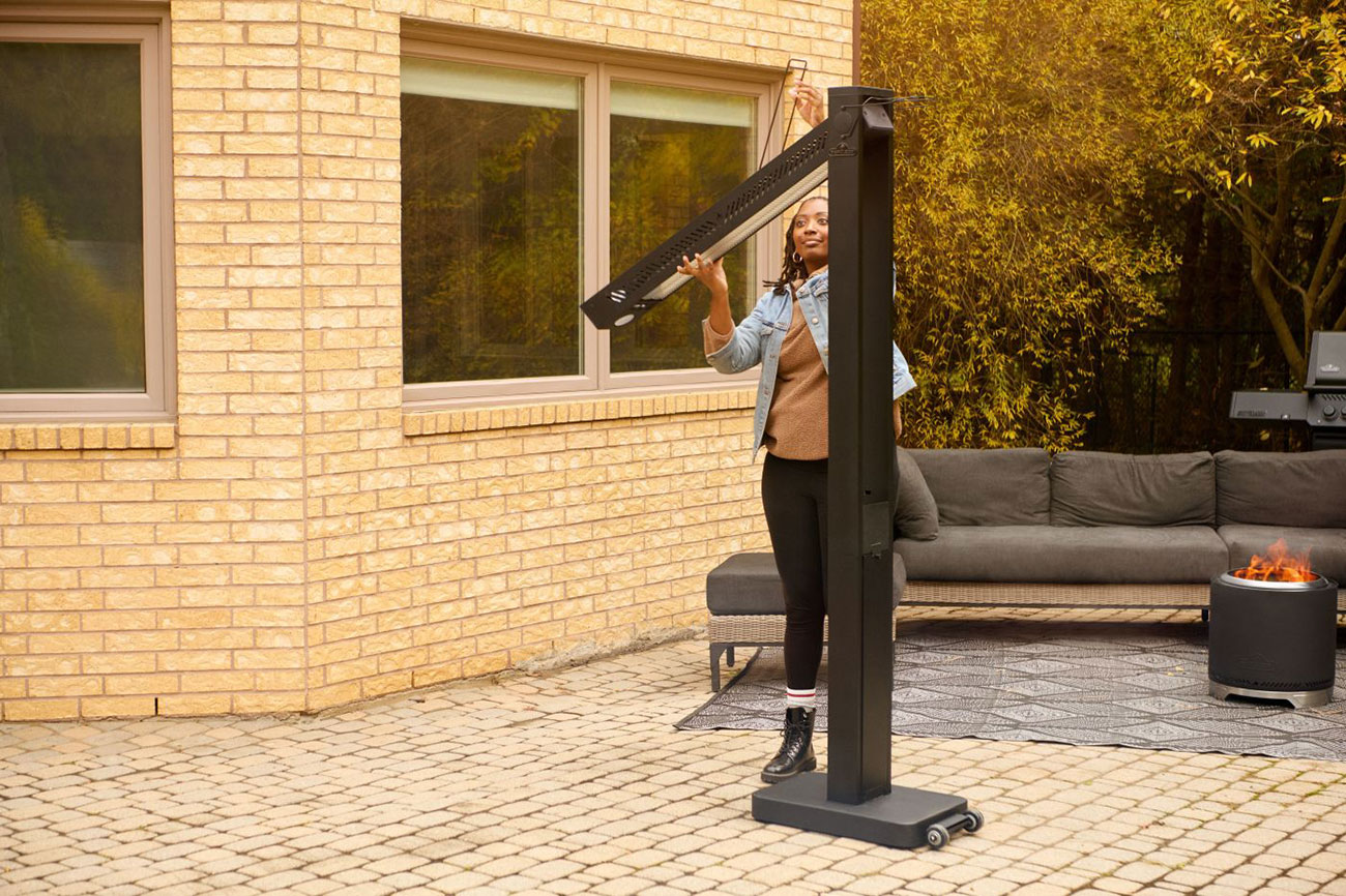 Lifestyle View of Lady Folding Heater
