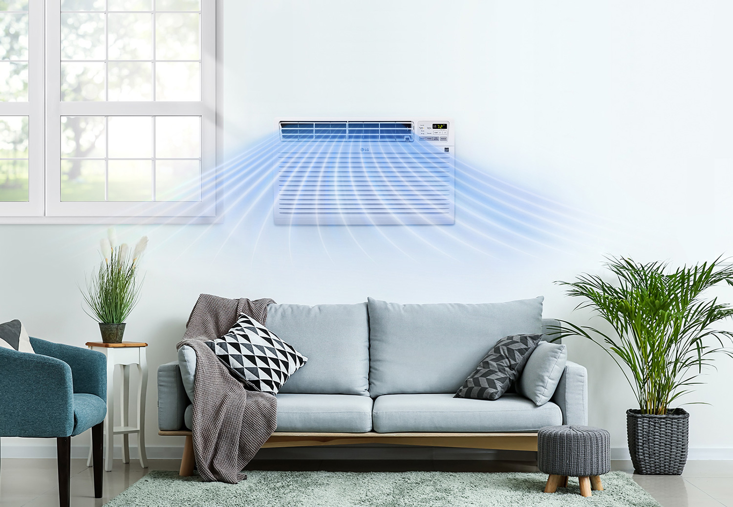LG Air Conditioner With an Air Flow Illustration Over a Couch in a Living Room
