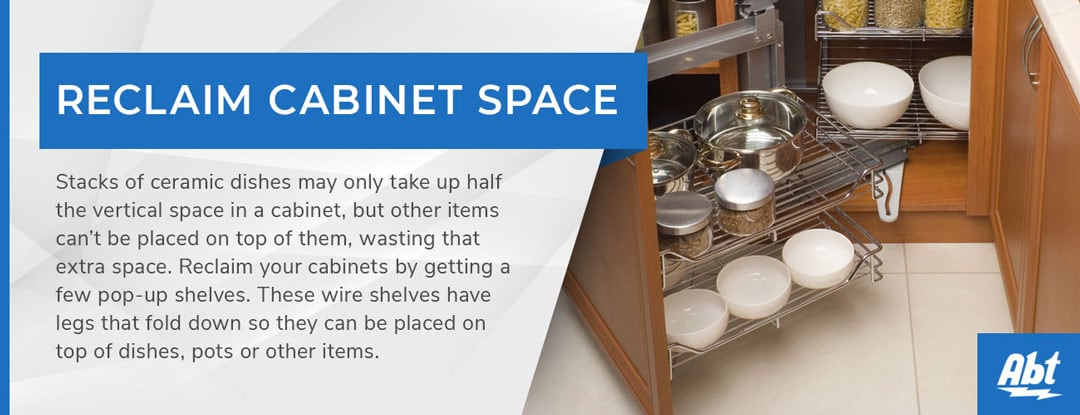 Stacks of ceramic dishes may only take up half the vertical space in a cabinet, but other items can