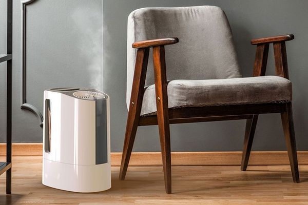 Ultrasonic Humidifier Beside a Chair