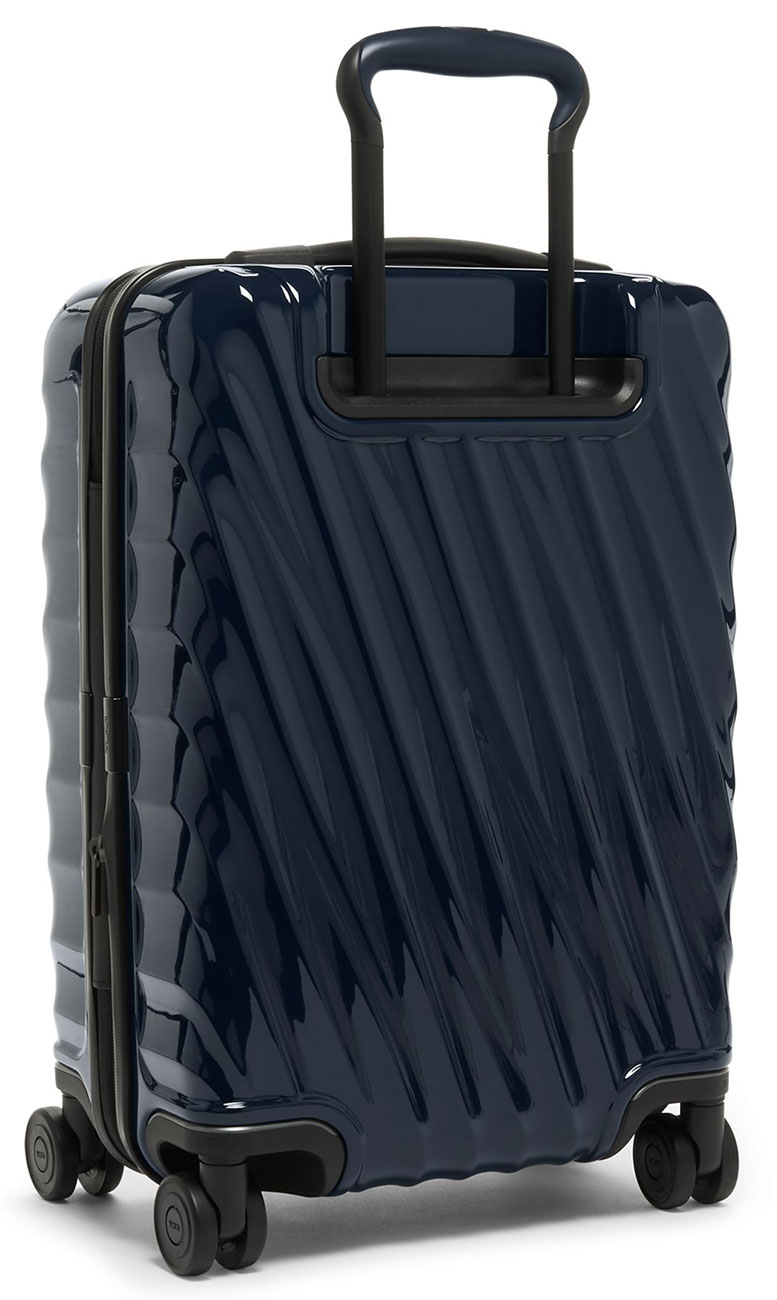 Angled Back View of the TUMI 19 Degree Navy International Expandable 4 Wheeled Carry-On