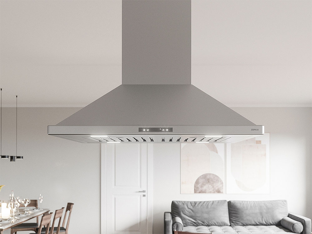 Front view of stainless steel island hood installed in kitchen