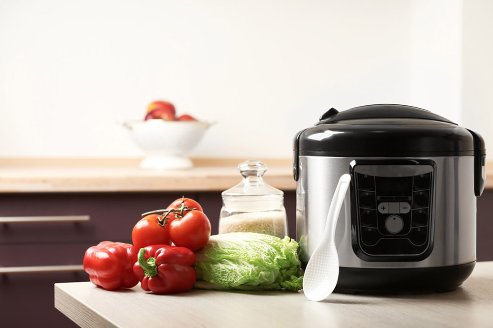 Vegetables next to pressure cooker
