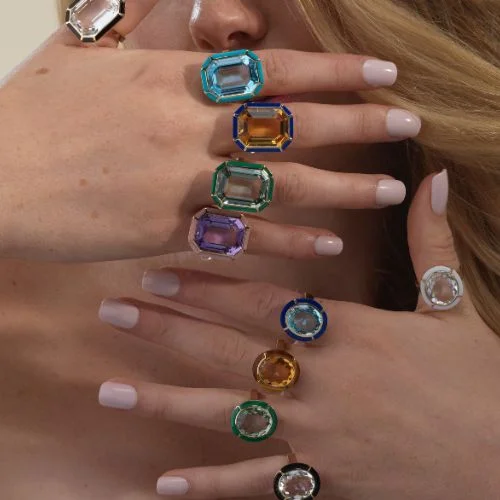 Tight shot on a persons hand with Goshwara Rings on each finger