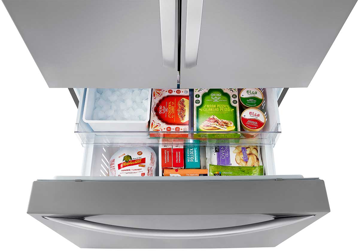 Top view of freezer with frozen goods inside.