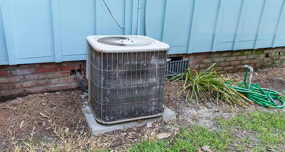 Old Central Air Conditioner that needs to be replaced