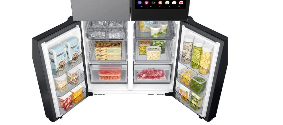 The Samsung freezer and flex zone both open and filled with groceries. You can see both ice makers