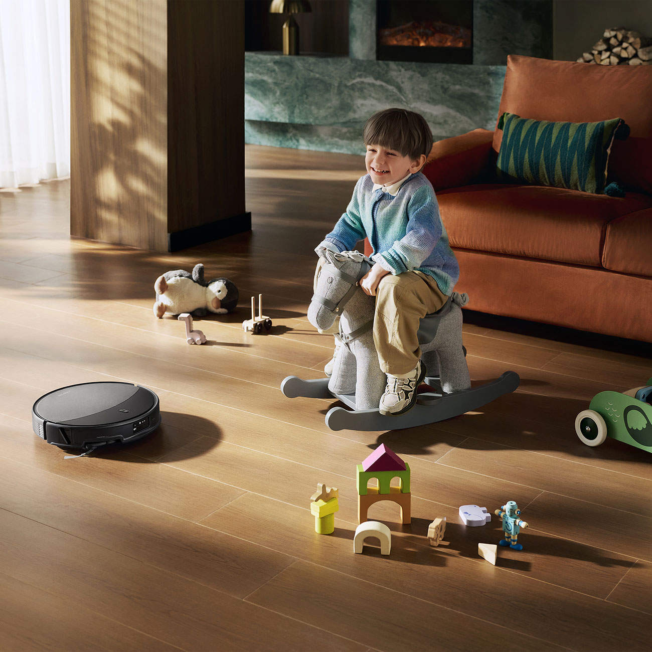 Lifestyle View of Robot Vacuum in Play Room