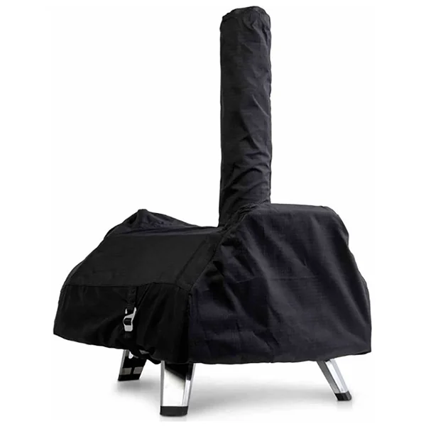 The Ooni Karu 16 pizza oven with a black Ooni oven cover over it