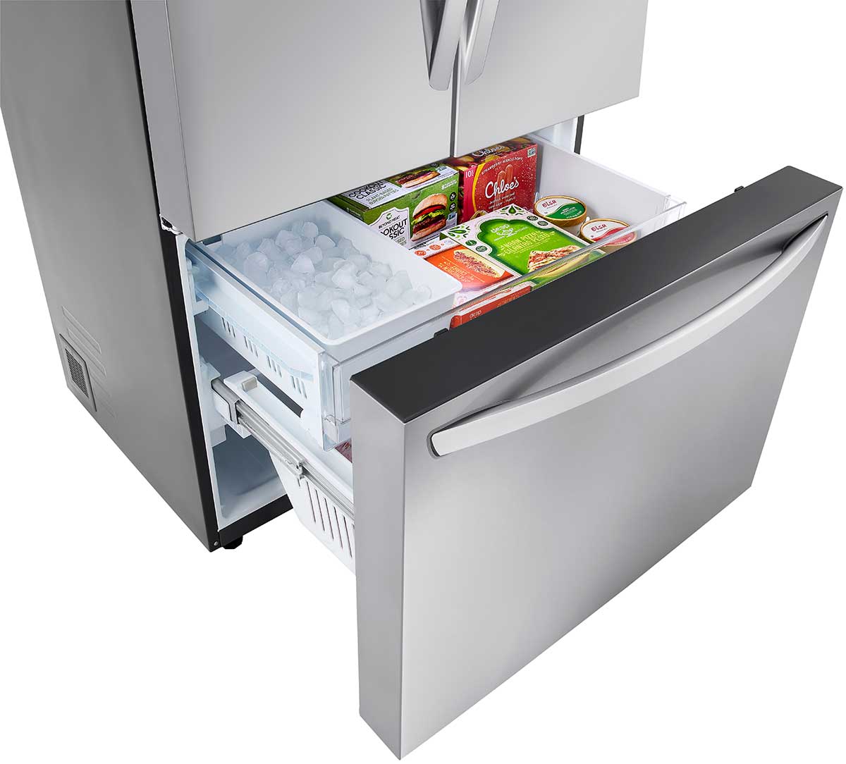 Angle of upper freezer drawer with frozen goods.