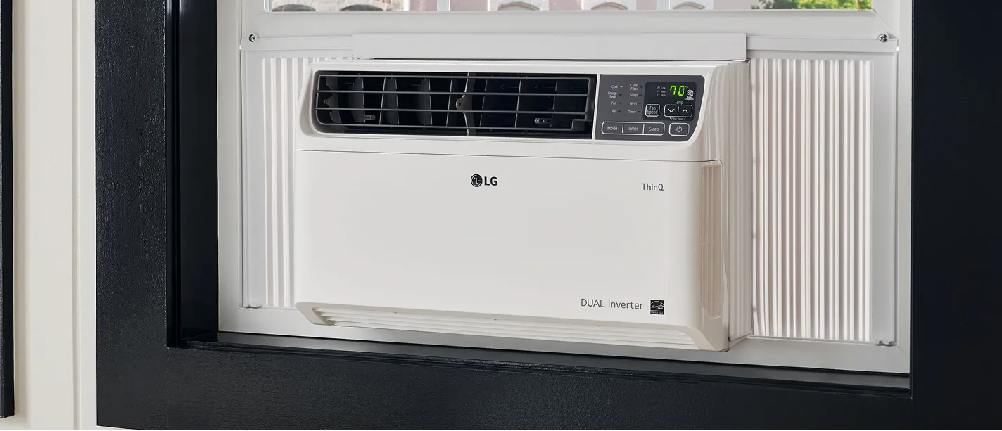 Window air conditioner installed beside curtains