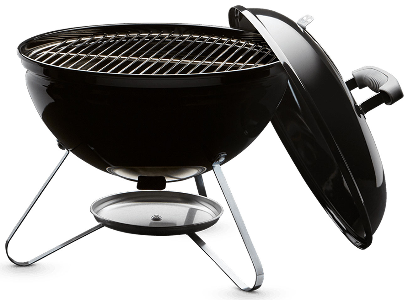 Open Lid and Empty Grills on a Weber Charcoal Smoker and Grill

