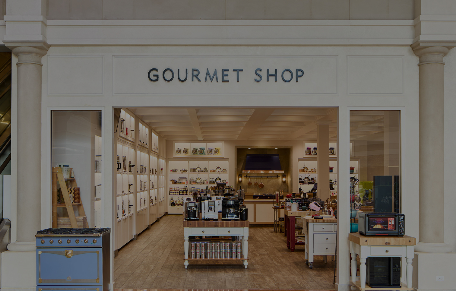 Exterior shot of the Gourmet Shop storefront in Abt's Glenview Atrium showcasing the wide varity of small appliances we carry