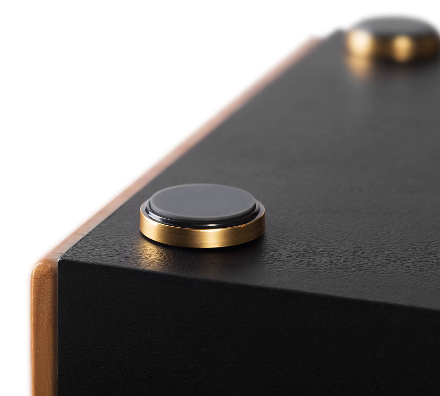 The Base of an Upside Down Walnut Edifier Walnut Bookshelf Speakers
