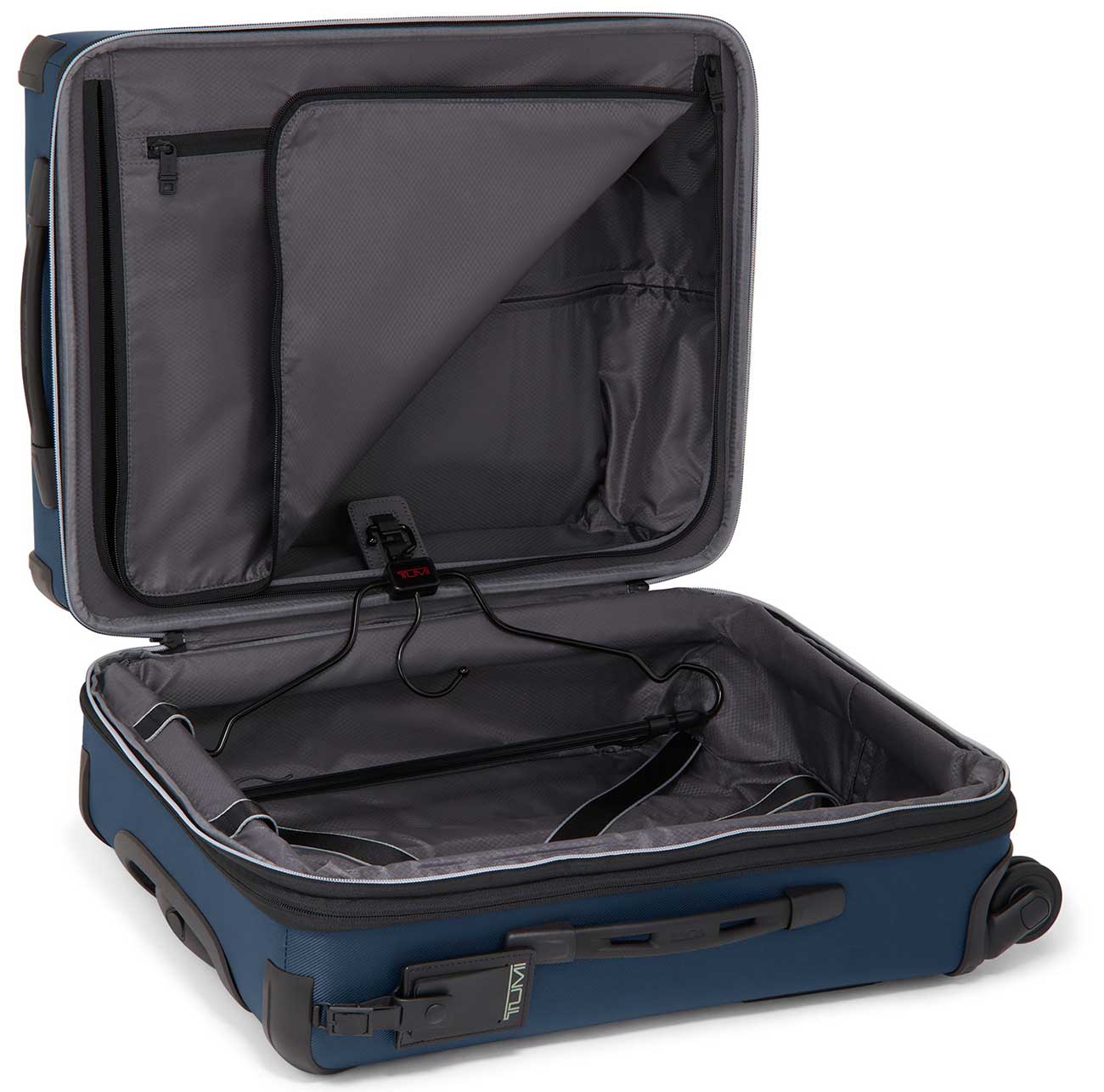View of TUMI Carry-On on its back unzipped with hanger showing