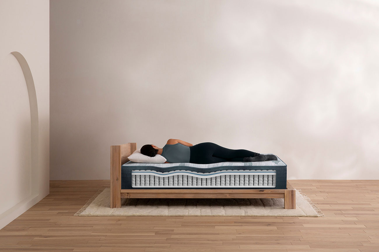 View of beauty rest mattress of model sleeping
