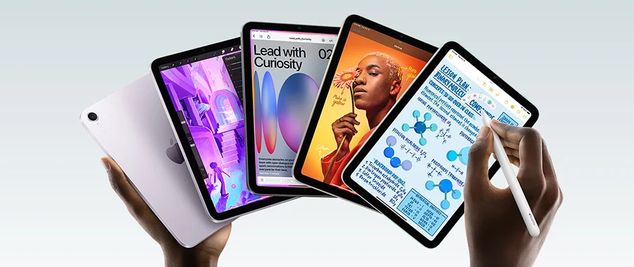 Hands holding the whole iPad Mini range