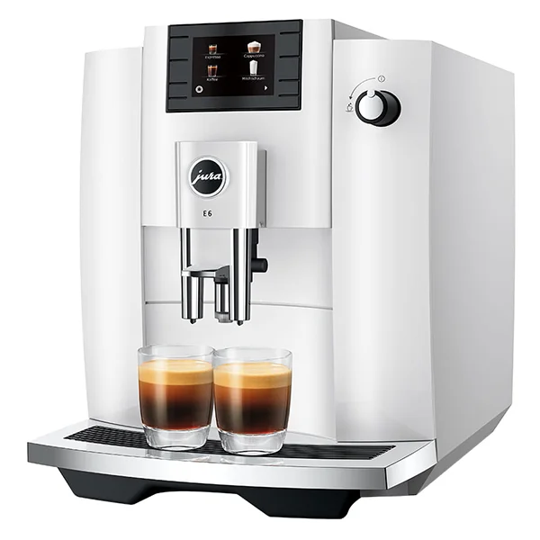 A white Jura E6 coffee machine with two shots of espresso sitting on the tray