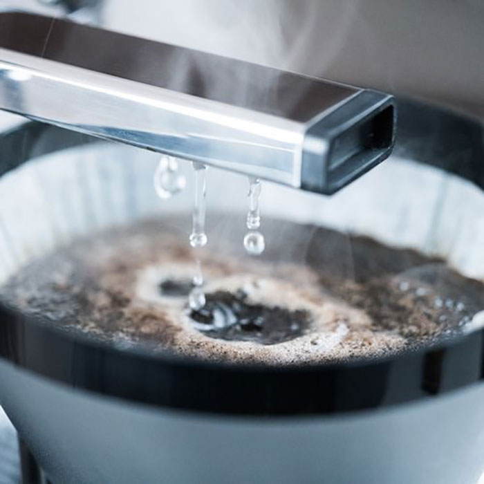 Hot Water Dripping Into Brewing Cup of a Technivorm Moccamaster KBGV Select 10 Cup Coffee Maker
