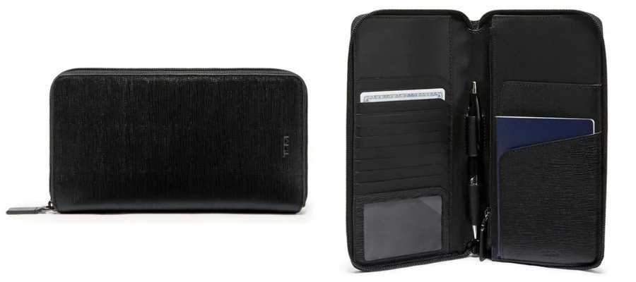 The exterior and interiors of the TUMI Nassau Travel wallet in black