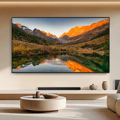 Outdoor TV mounted above fireplace