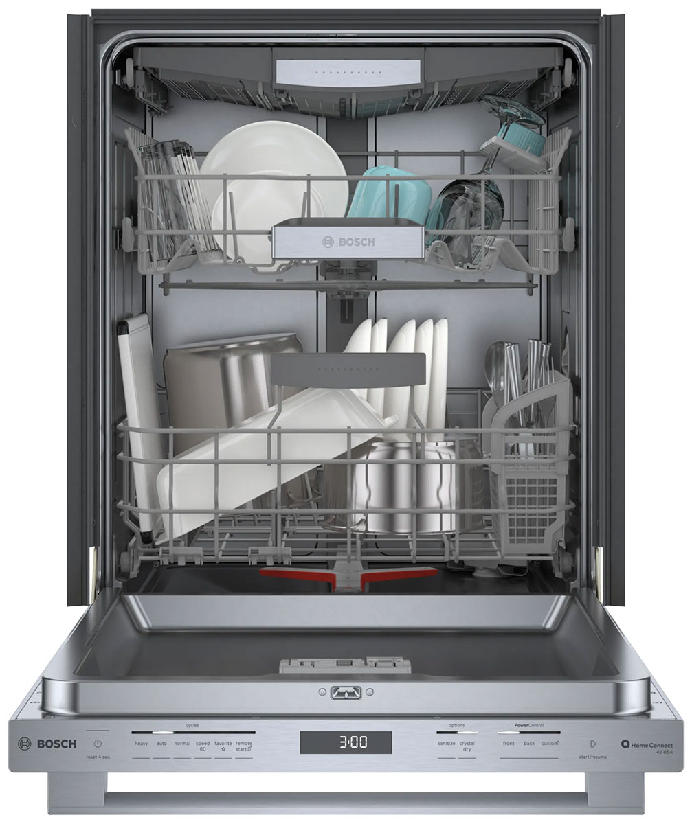 Open door with cups, plates and utensils inside.
