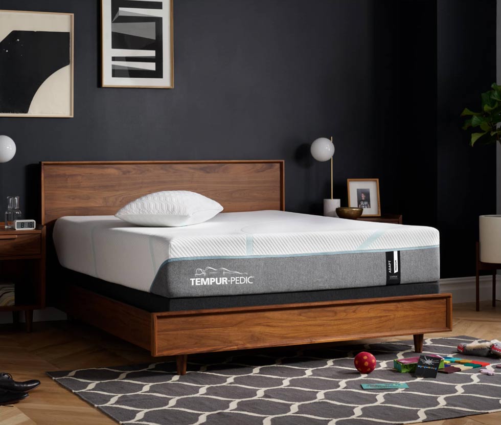 Tempur-Pedic bed and bedframe in a room