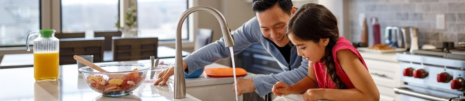 Hot water faucet pouring into a bowl