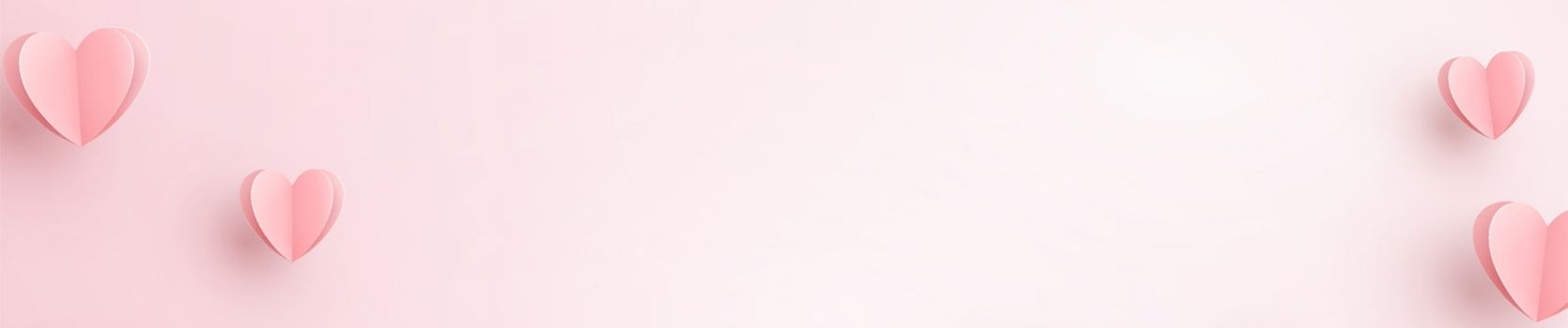 Stylized pink background with paper hearts on the corner and Valentines Day displayed within the banner