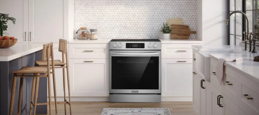 The Frigidaire Gallery range in a minimalist, white kitchen.