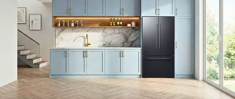 A Zero Clearance Fit refrigerator from Samsung, installed in a modern, light blue kitchen.