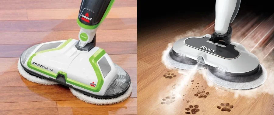 Side-by-side images of the Bissell SpinWave mop cleaning hardwood and the Shark Steam & Scrub mop cleaning hardwood with dirty paw prints.