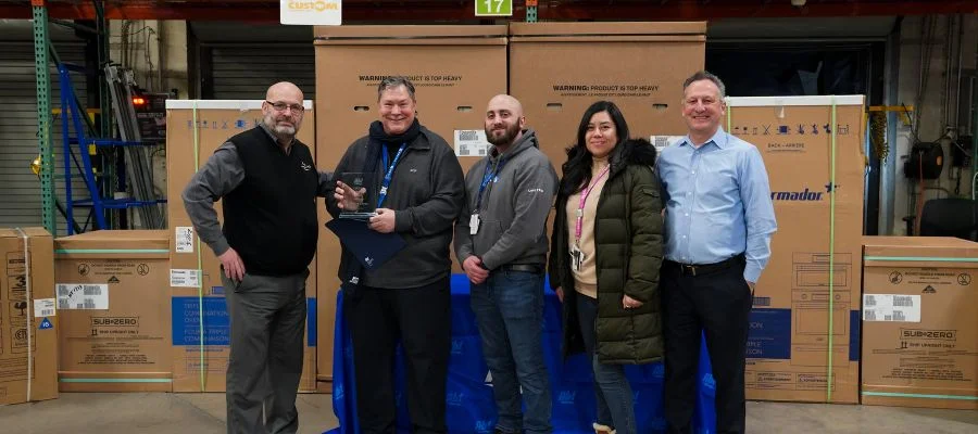 The team from United Cargo accepting a Carrier of the Year award beside Abt's Gary Quinton