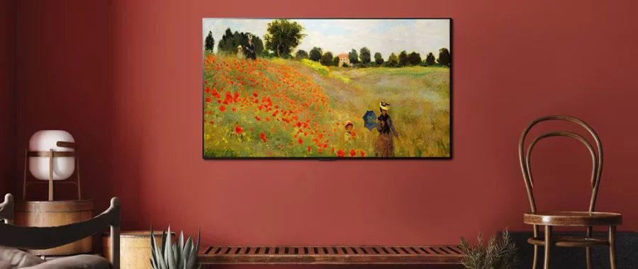 Against a red wall, the LG Gallery TV displays an impressionist painting of a mother and child in a field.
