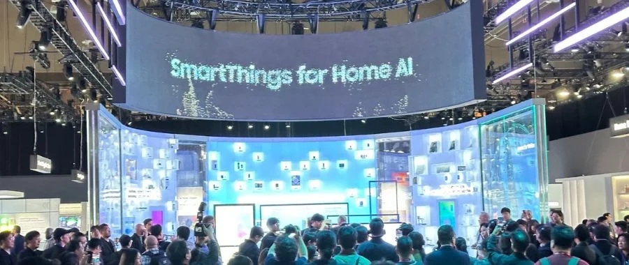 The Samsung CES 2025 booth displaying a large, bright sign for SmartThings Home AI