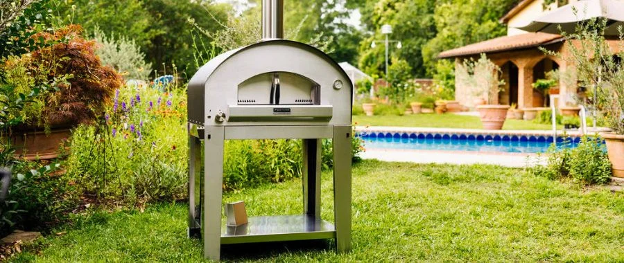 The Fontana Firenze set up in a backyard with a pool in the background.