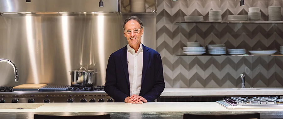 Mick De Giulio standing in one of the luxury kitchens in Abt's Inspiration Studio.