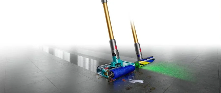 A Wet/Dry Dyson vacuum next to a standard Dyson vacuum.