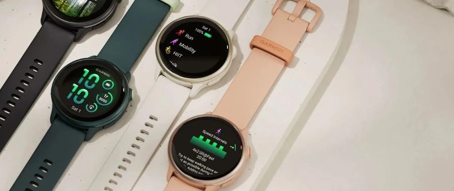 All four colors of Garmin vivoactive 6 watches beside each other on a table.