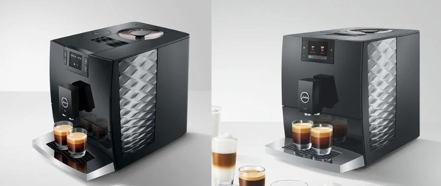 Jura C3 and C9, both in piano black, ide-by-side on a gray background.