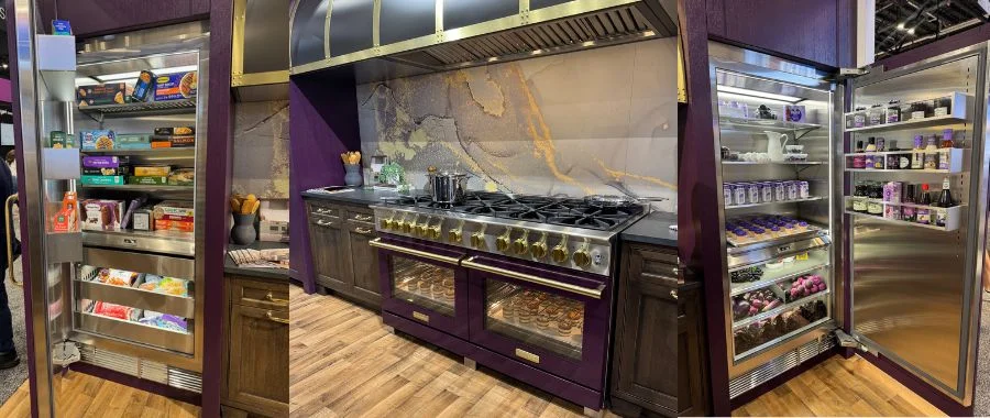 Display of BlueStar built-in refrigerator and gas range in Purple Violet with a large bronze range hood above.