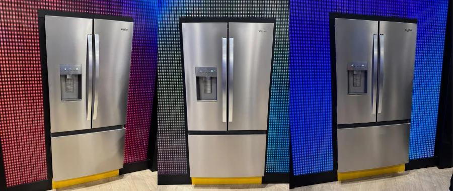 View of the Whirlpool stainless steel refrigerator with nugget ice from three different angles in front of a multicolor light display