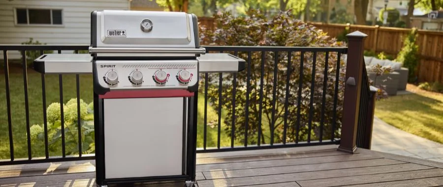 The Weber Spirit S-425C liquid propane grill on a beautiful outdoor deck.