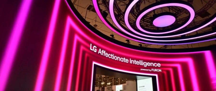 A pink and red stage at LG's showcase announcing affectionate intelligence