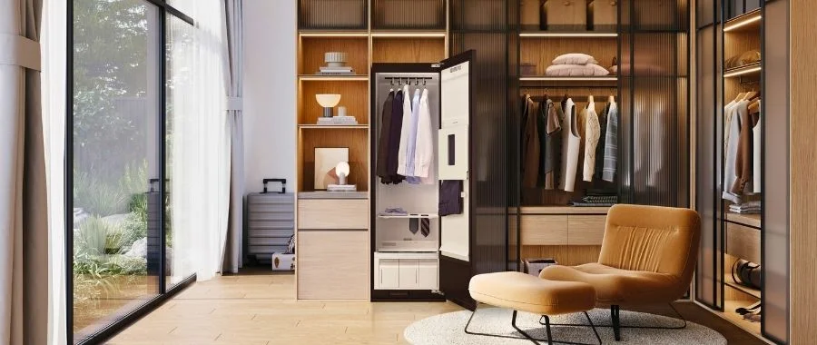 The LG Styler steam closet installed in a modern, walk-in closet.